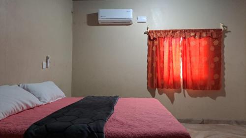 Ein Bett oder Betten in einem Zimmer der Unterkunft Hospedaje san agustin