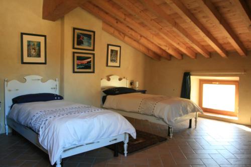 Posteľ alebo postele v izbe v ubytovaní SacreTerre B&B e Agriturismo