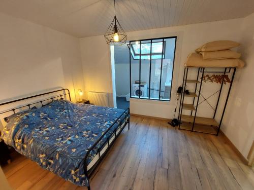 Posteľ alebo postele v izbe v ubytovaní Appartement proche des remparts