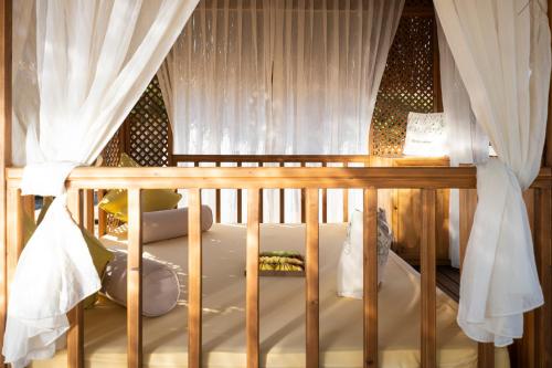 Ένα ή περισσότερα κρεβάτια σε δωμάτιο στο Wome Deluxe Hotel - Halal All Inclusive