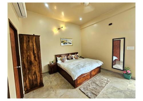 Ένα ή περισσότερα κρεβάτια σε δωμάτιο στο Blissful Townhouse