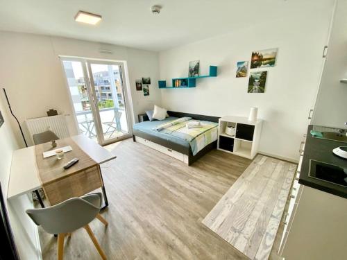 Foto Carefree Mikroapartment inkl. Balkon + Tiefgarage 1