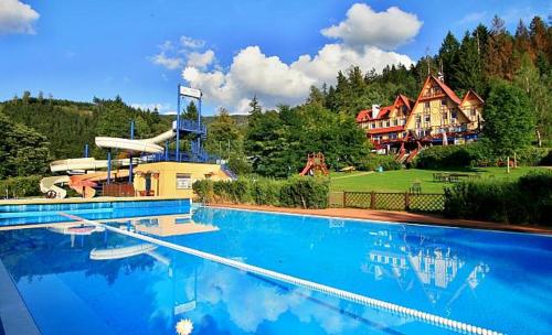 Bazén v ubytování Hotel Sluníčko nebo v jeho okolí