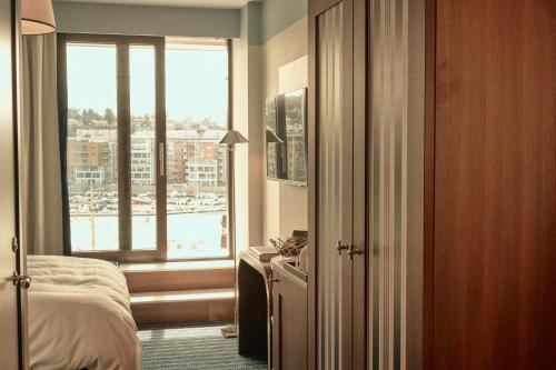 Postel nebo postele na pokoji v ubytování Hotel Klubben