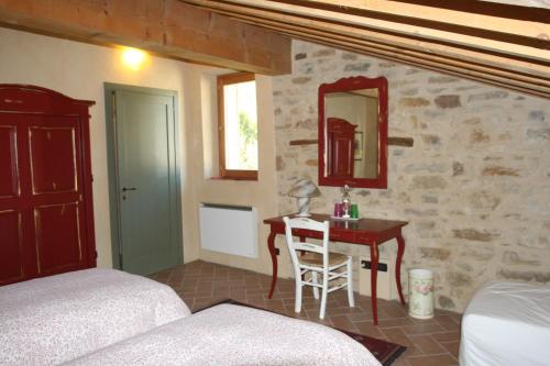 Posteľ alebo postele v izbe v ubytovaní SacreTerre B&B e Agriturismo