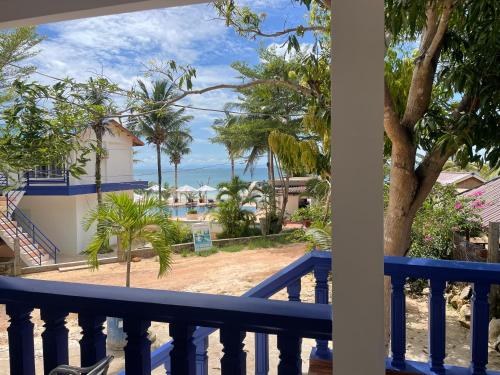 a balcony with a view of the ocean at Amor Resort Koh Rong in Koh Rong Island