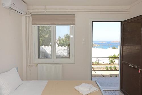 Postel nebo postele na pokoji v ubytování Aira Apartments