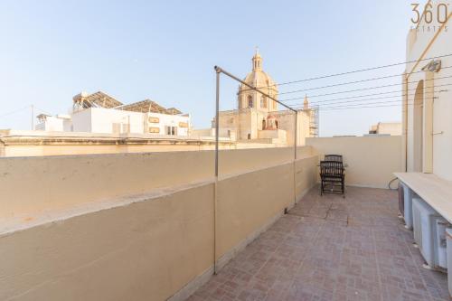 a view from the balcony of a building at Lovely Home with Private Terrace in Zebbug, Gozo by 360 Estates in Żebbuġ