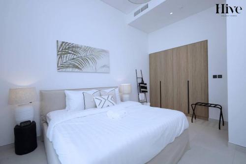 Giường trong phòng chung tại 7 by Aurora 209