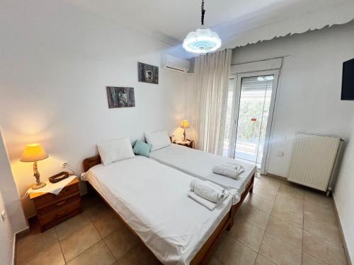 A bed or beds in a room at Studios Vaso