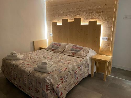 Hotel Sciatori 3 Stelle Superiorにあるベッド