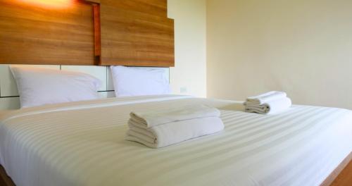 Seastar Hotel and Service Apartmentにあるベッド