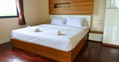 Seastar Hotel and Service Apartmentにあるベッド