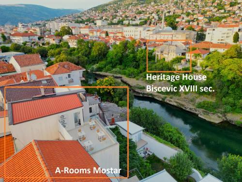 a view of a town with a river and buildings at A-Rooms Serviced Accommodation in Mostar in Mostar