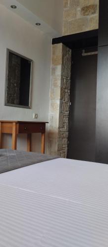 Ένα ή περισσότερα κρεβάτια σε δωμάτιο στο Rodiola House