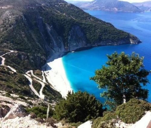 a view of a mountain with a blue lake at Agia Efimia Seaside in Agia Effimia in Ayia Evfimia