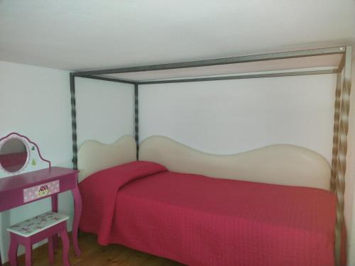 Ένα ή περισσότερα κρεβάτια σε δωμάτιο στο Casa buongiorno orani