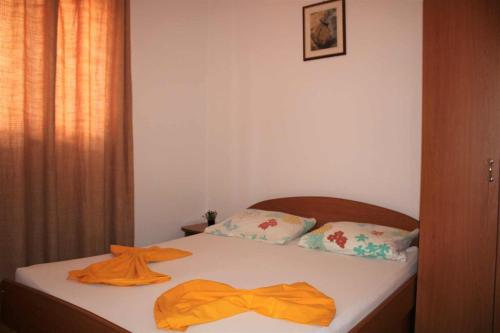Postel nebo postele na pokoji v ubytování Apartments Pidi