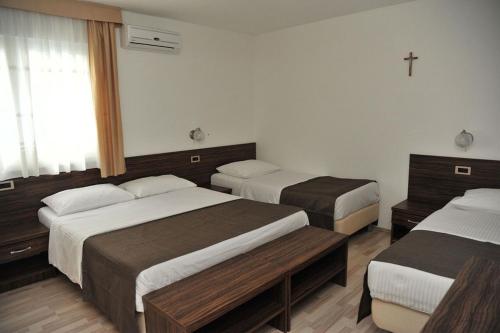 Katil atau katil-katil dalam bilik di Hotel Branco