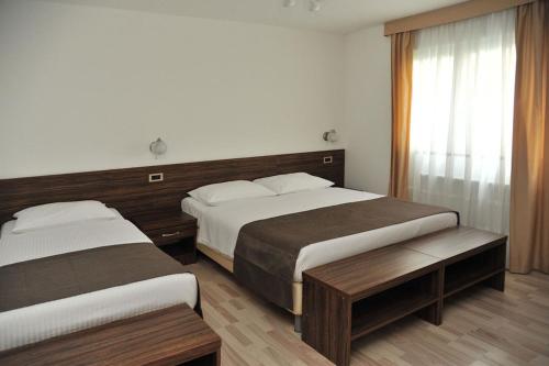 Katil atau katil-katil dalam bilik di Hotel Branco