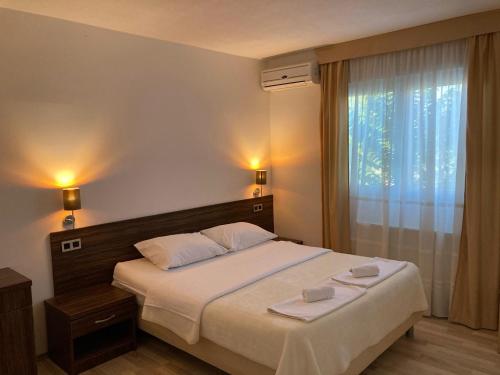 Katil atau katil-katil dalam bilik di Hotel Branco