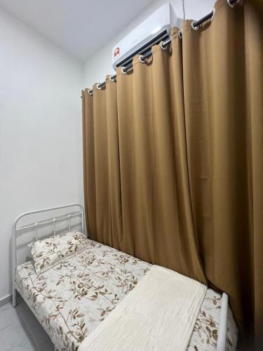 Cama o camas de una habitación en CFD Homestay PS Dungun