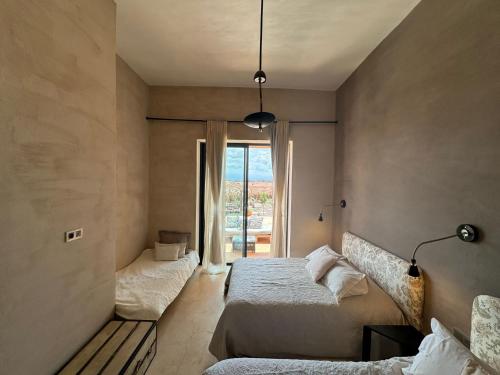 Katil atau katil-katil dalam bilik di Villa Kela Serene