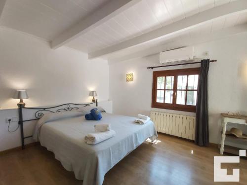 Postel nebo postele na pokoji v ubytování Bungalow La Merced 34G - Grupo Turis