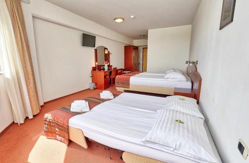 Hotel Krek Superiorにあるベッド