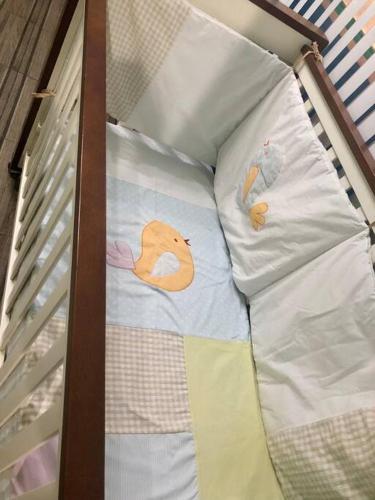 a bed with two stuffed animals on it at Departamento Céntrico, acogedor, comodo, pequeño in Orizaba