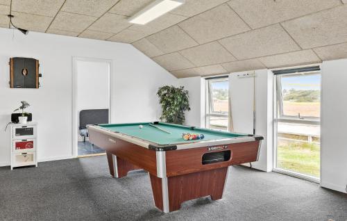 a billiard room with a pool table in it at Beautiful Home In Snedsted With Sauna in Snedsted