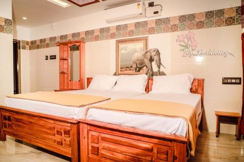 Postel nebo postele na pokoji v ubytování Lily Homestay