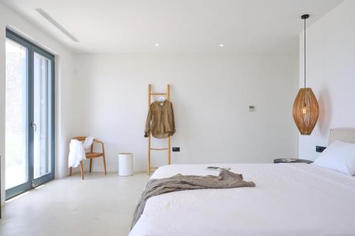 Ένα ή περισσότερα κρεβάτια σε δωμάτιο στο Villa Agate