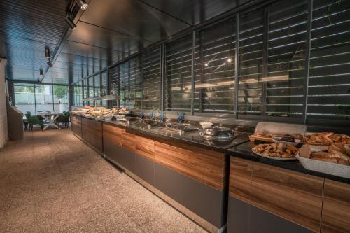 a buffet line with many different types of food at Nun Hotel in Antalya