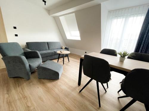 Ruang duduk di HOLI City Apart Hotel Berlin