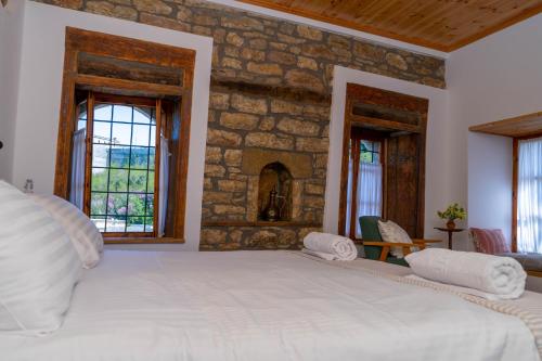 Postel nebo postele na pokoji v ubytování Belaj's House