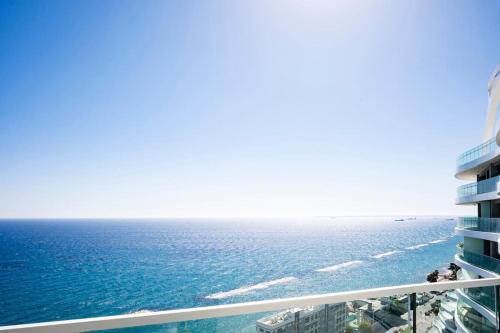a view of the ocean from the balcony of a building at Del Mar 2 Luxe Bedroom 'C' Highrise Residence in Limassol