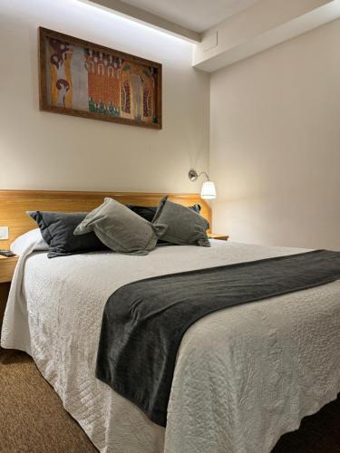 Ein Bett oder Betten in einem Zimmer der Unterkunft Nest Style Santiago