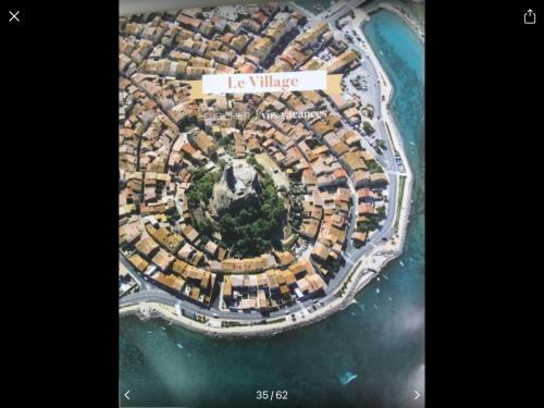 arial view of a city with a sign that reads la village at Maison Chalet 200 m de la plage climatisation et Wifi in Gruissan