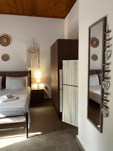 Postel nebo postele na pokoji v ubytování Moxy Paxos - Cozy Home