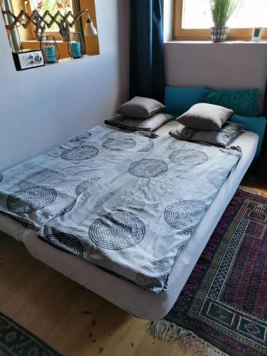 Postel nebo postele na pokoji v ubytování Ferienwohnung "Josefine und Ihr Kavalier"