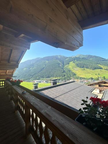a balcony with a view of a mountain at Sportpension Enzian in Saalbach Hinterglemm