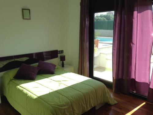 Cama ou camas em um quarto em La Primera Villa