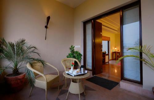 Achrol Niwas A TreeHouse Hotelにあるベッド