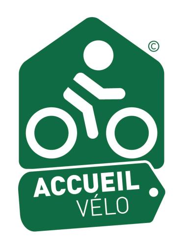 a green sign with a sign for aocalcil velo at Le Galussel Gite d'étape et de séjour in Saint-Sébastien