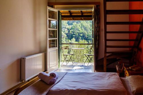 Postel nebo postele na pokoji v ubytování New Helvetia Hotel