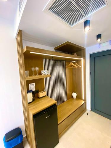 Η κουζίνα ή μικρή κουζίνα στο Tramonto Maisonettes & Suites