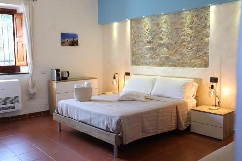 Postel nebo postele na pokoji v ubytování Il Quadrifoglio B&B