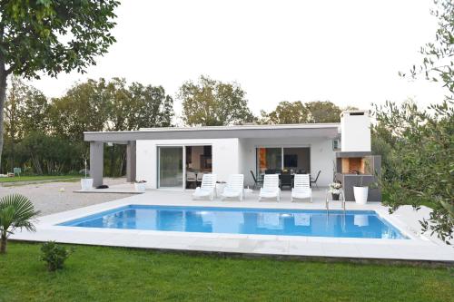 Foto Holiday Home Maslina 2
