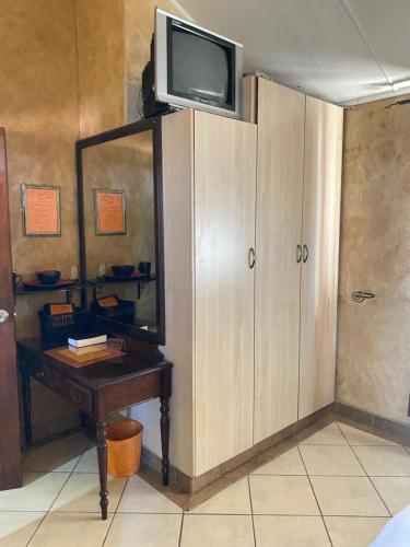 TV/trung tâm giải trí tại The Orange room